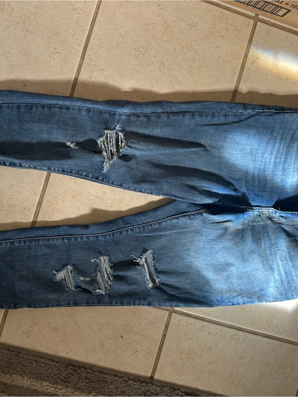 Levi's Women's Distressed Dark Blue Skinny Jeans